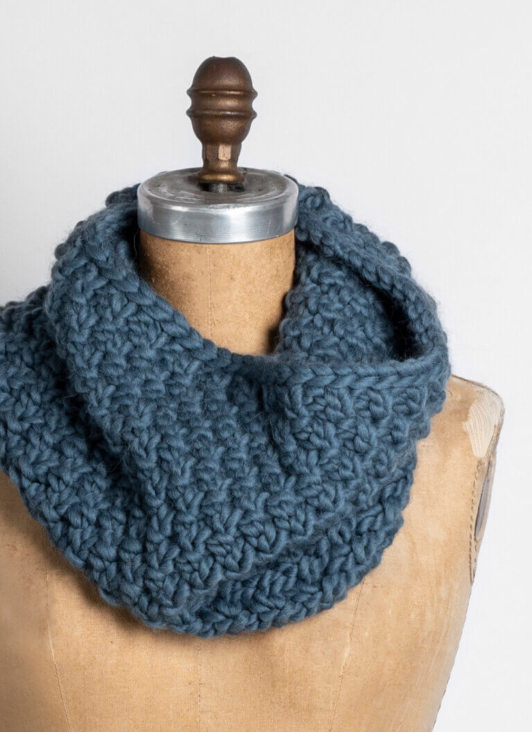 Lutsen Cowl pattern in new bulky color Steel Blue styled on a mannequin