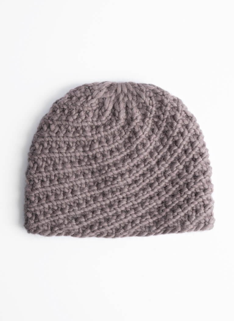 Rib Mountain Hat bulky pattern in color hedgehog styled as laydown